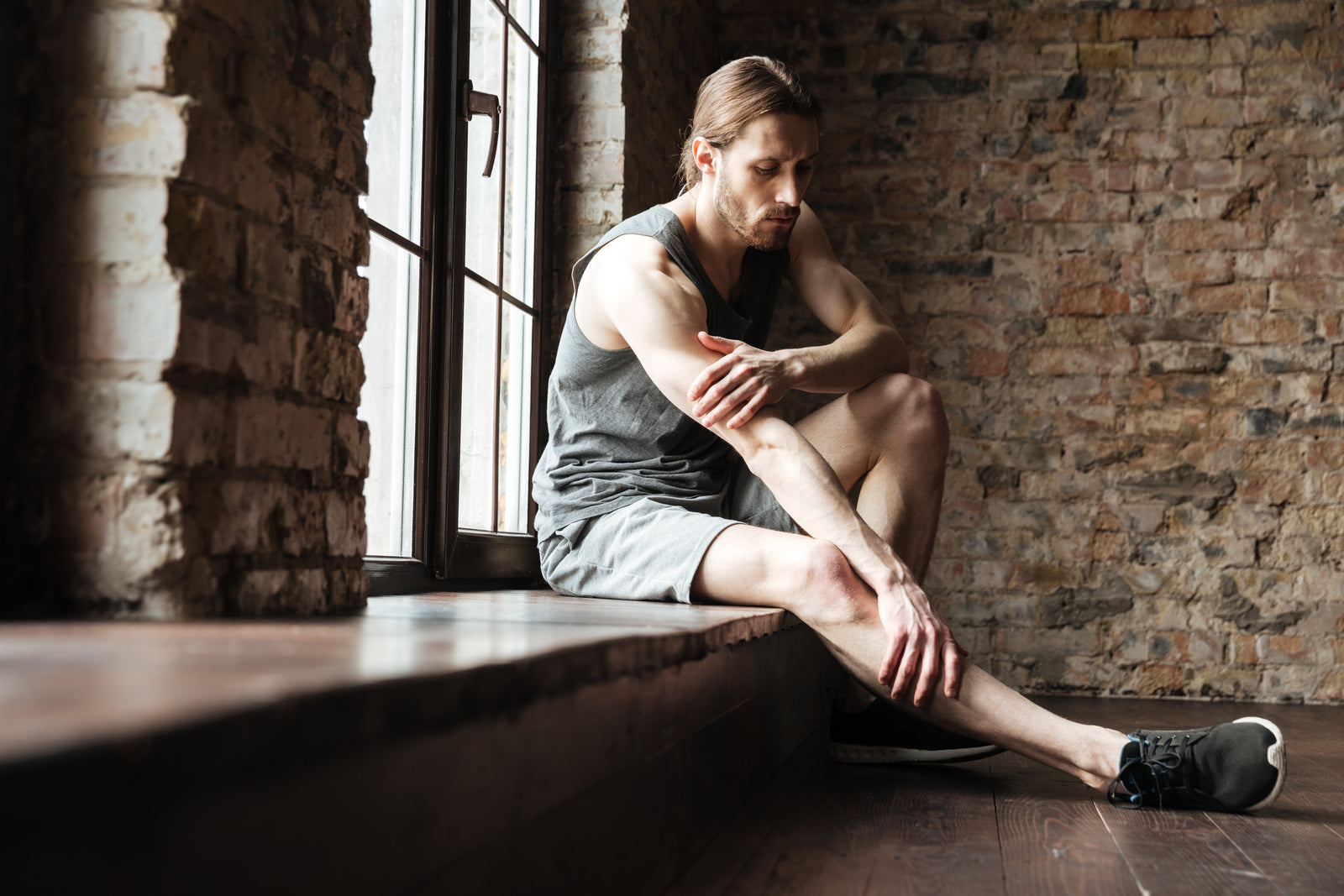 WHAT CAUSES MUSCLES SORENESS AFTER EXERCISE?